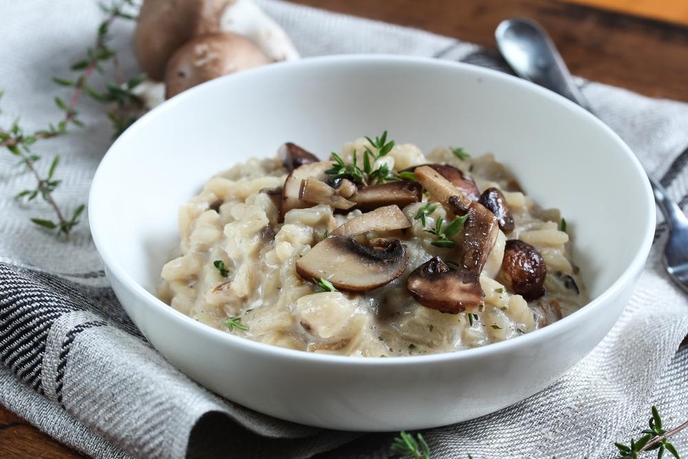 1. Mushroom risotto garnished with thyme leaves